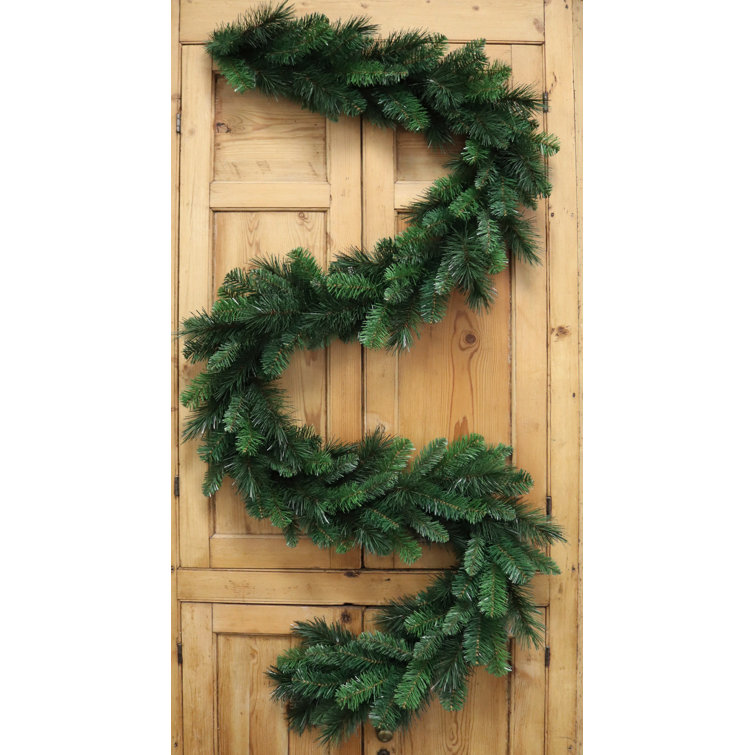 The Holiday Aisle® Artificial 9' X 12" Evergreen Garland 190 Tips